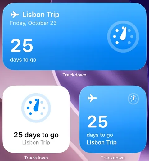iPhone Home Screen with three Trackdown widgets, each showing 25 days to Lisbon Trip: a wide countdown, a dial and a small countdown.