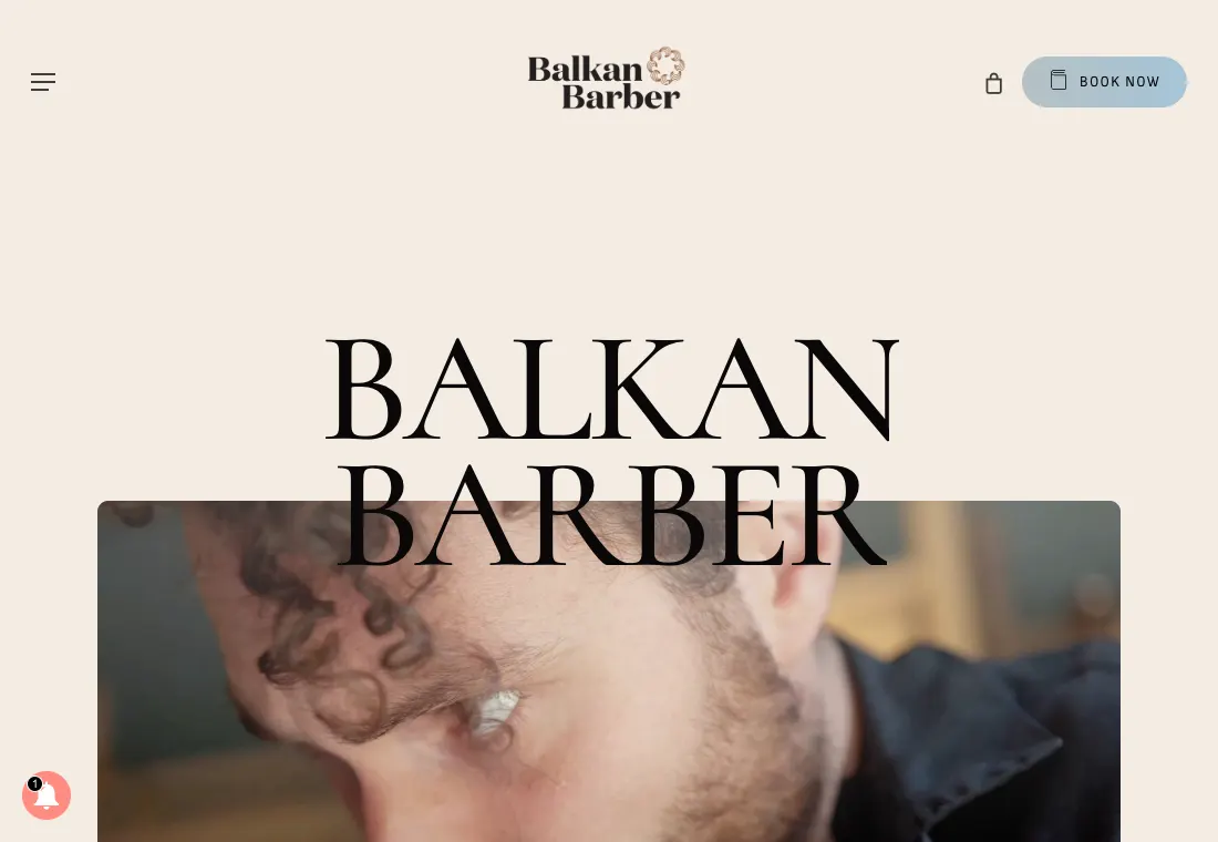 Balkan Barber homepage on balkanbarber.com, with the salon’s wordmark above a hero image.